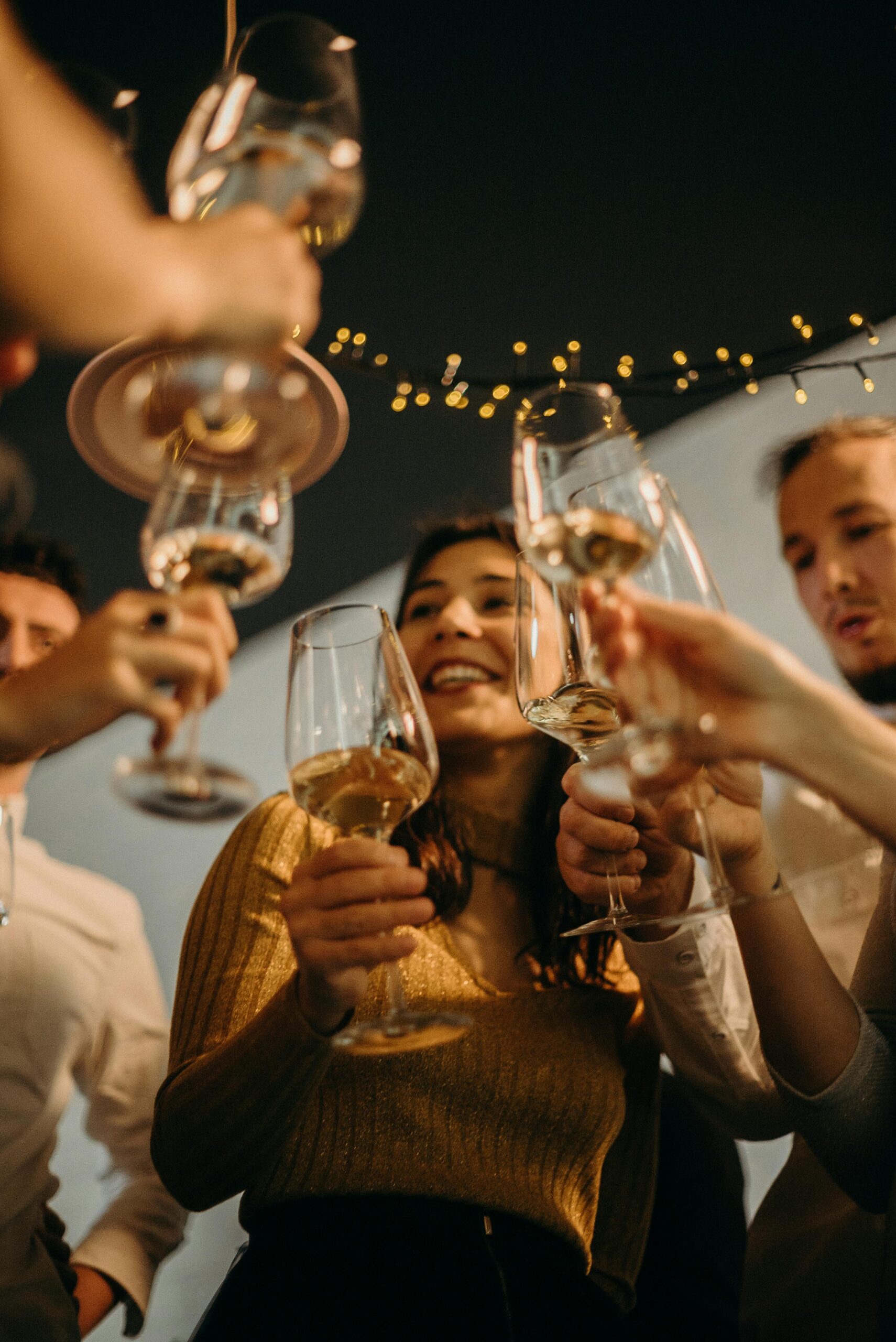 Group of young professionals toasting with wine