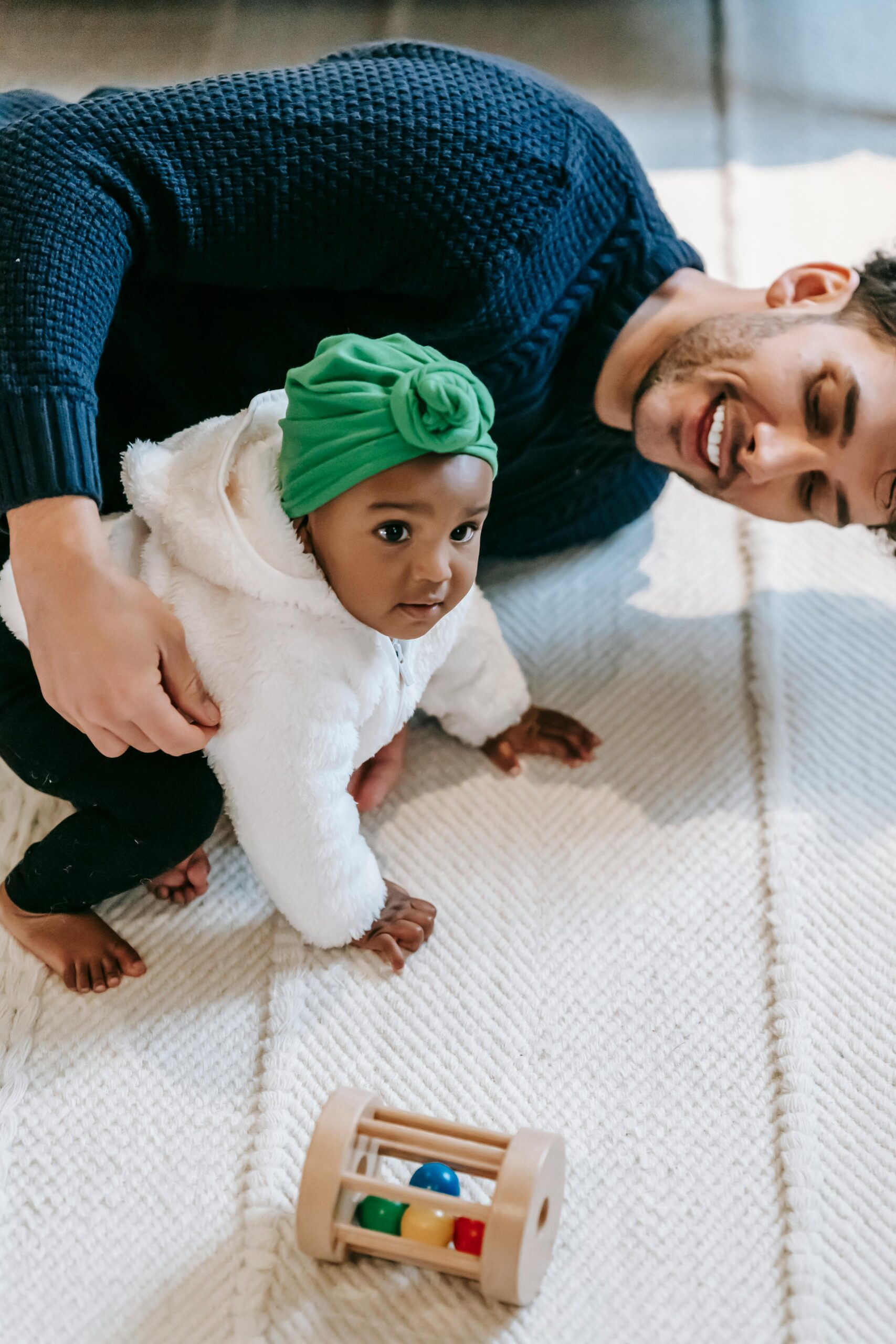 Dad playing with a baby