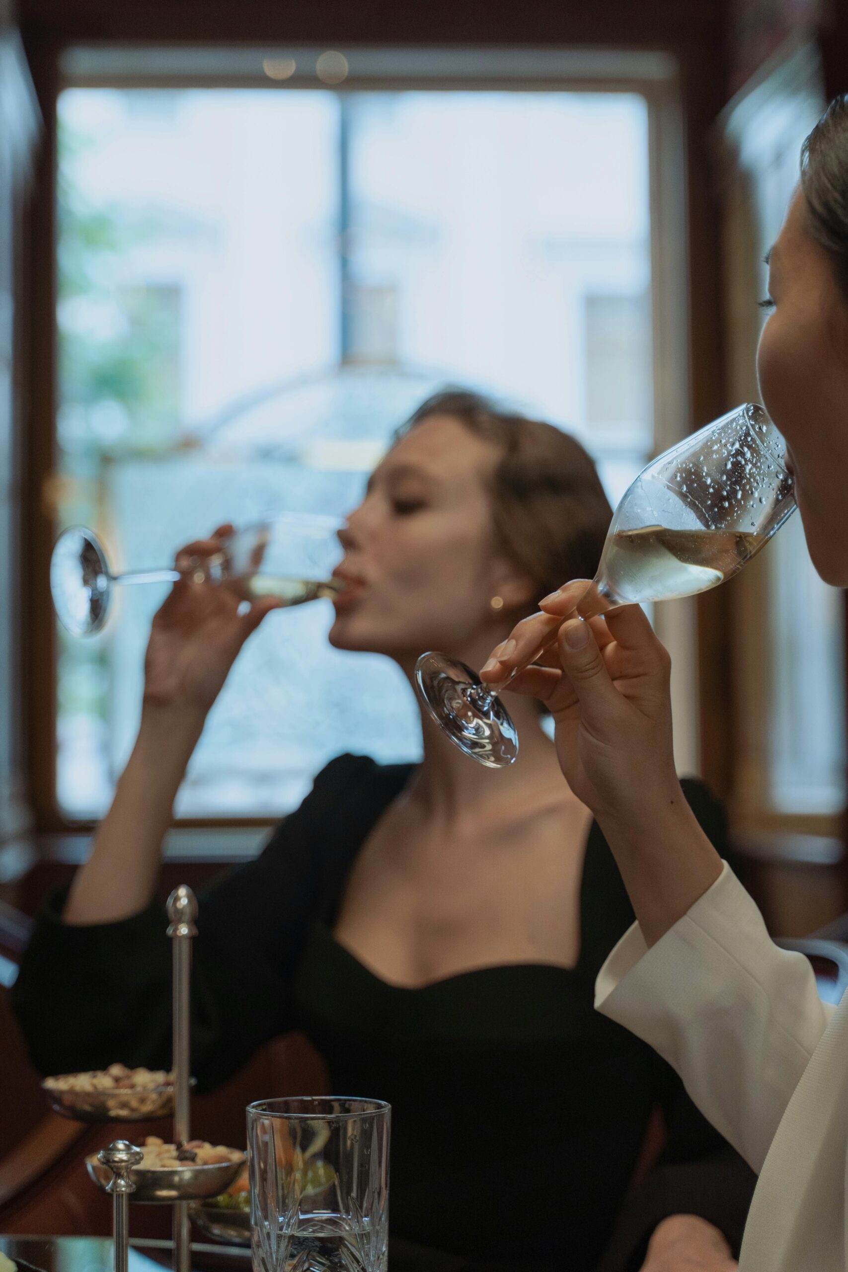 Man and woman tasting wine