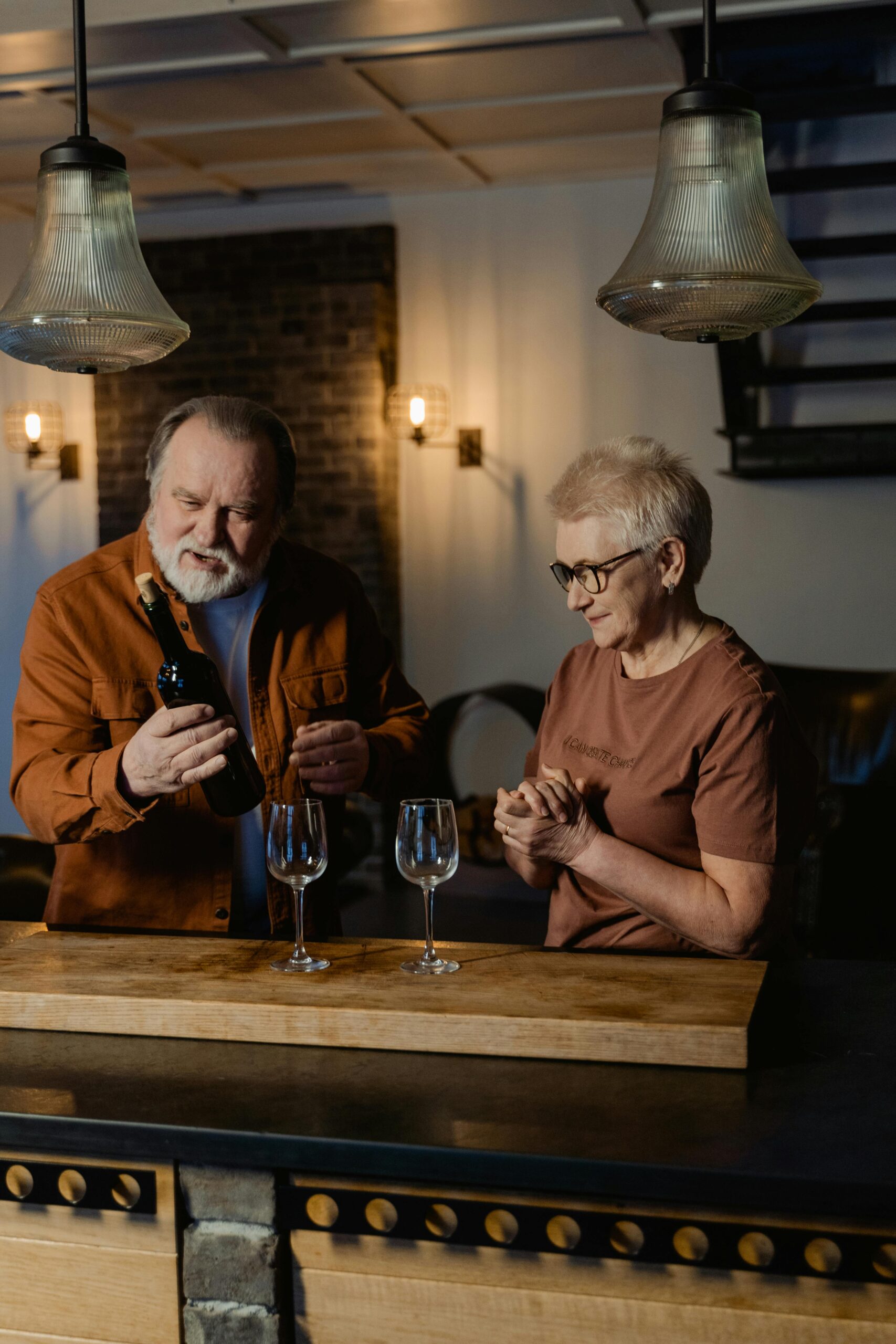 Retired couple drinking wine