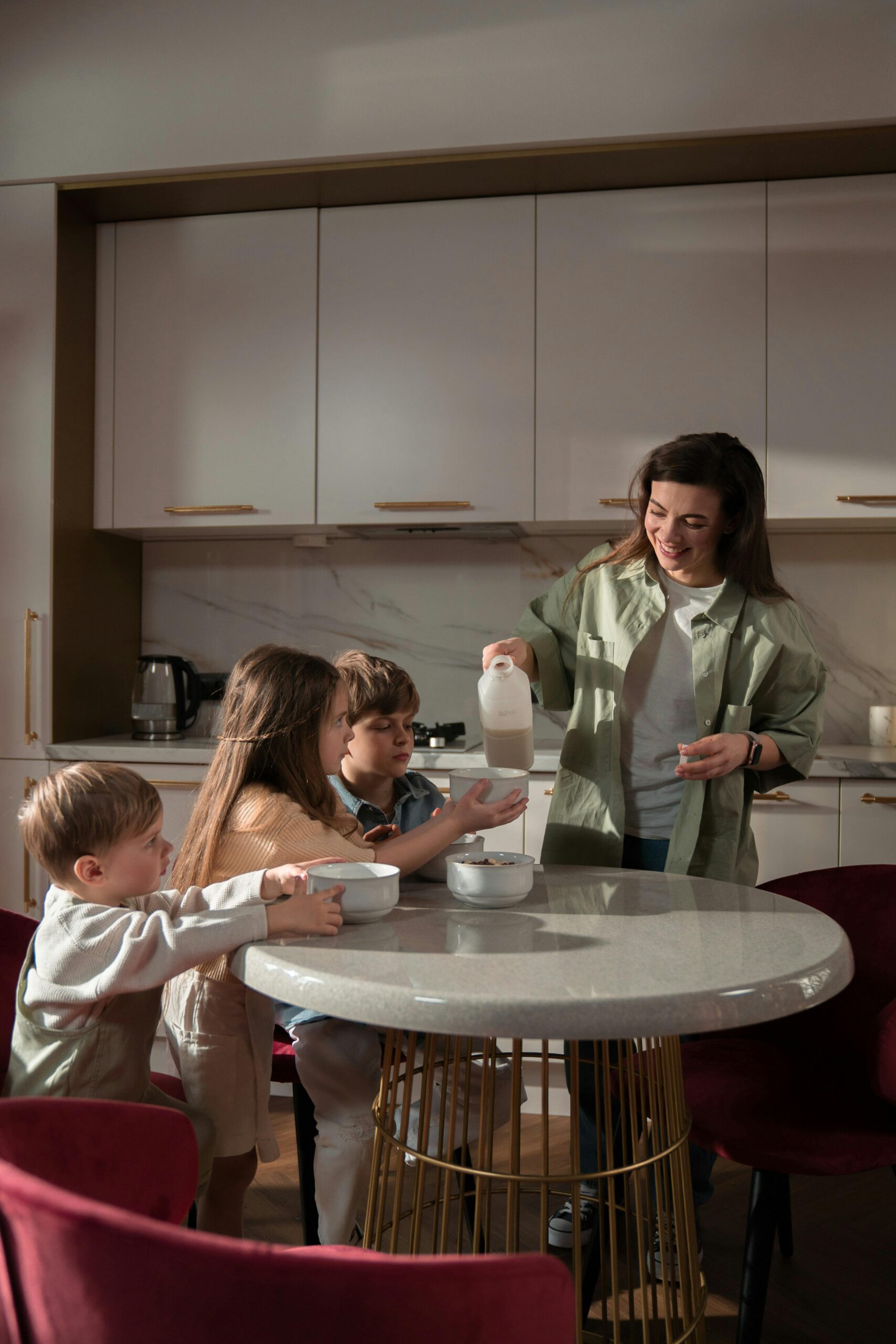 Busy mom making breakfast for 3 kids