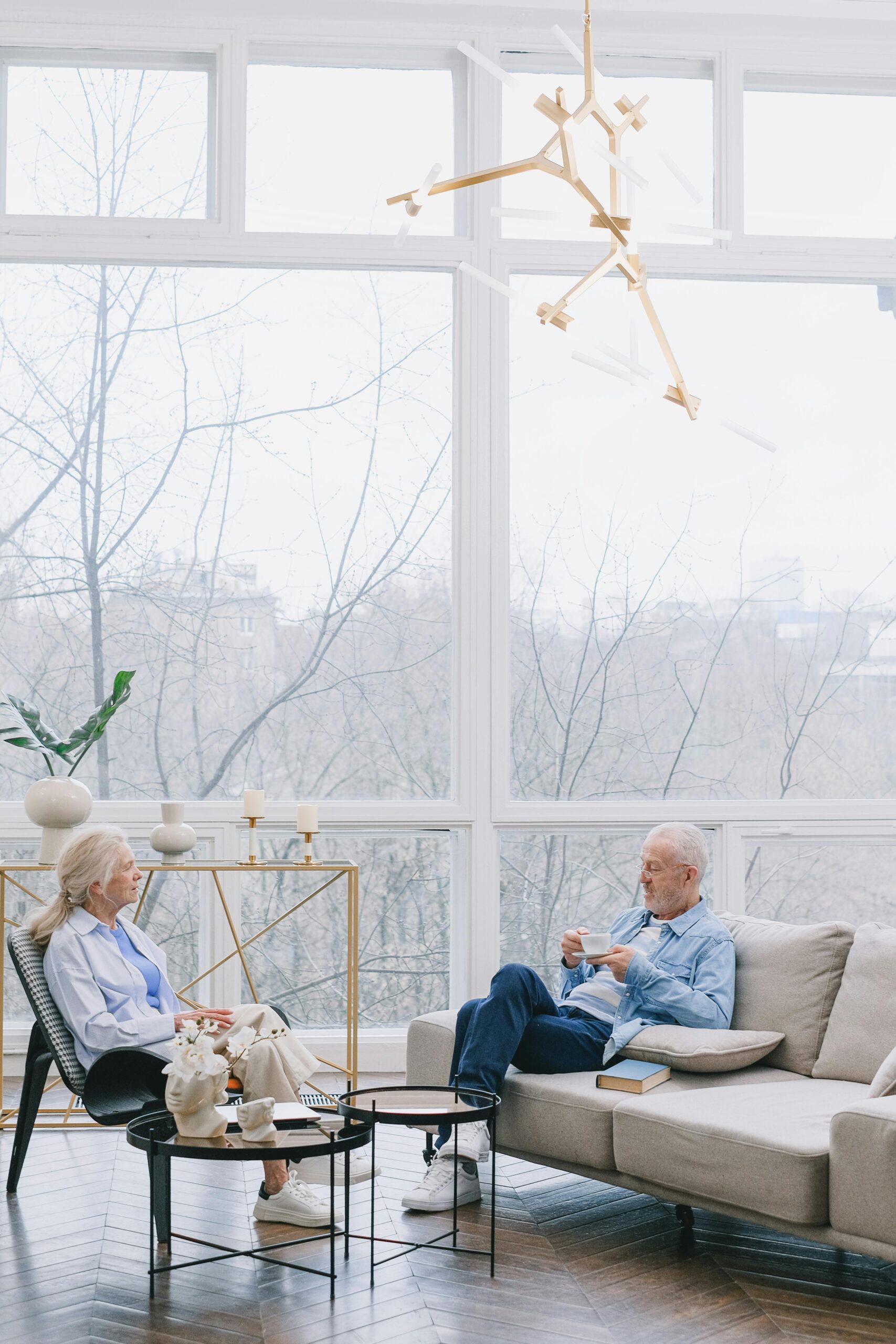 Retired couple talking in their living room