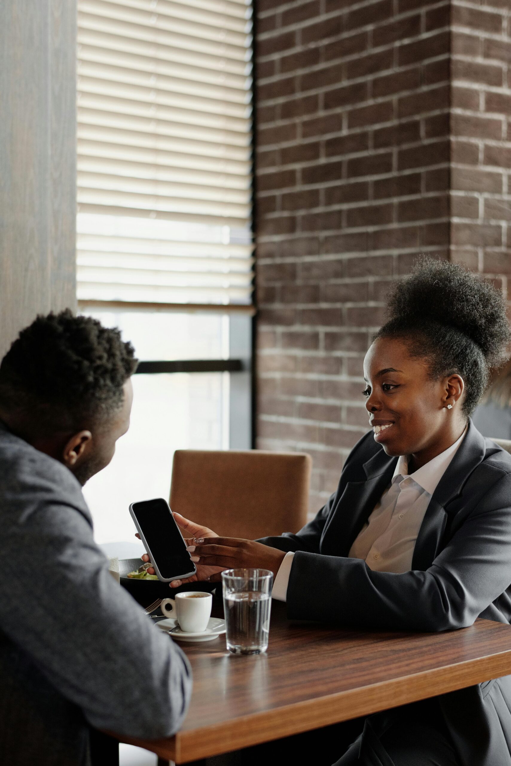 Two people working in an office