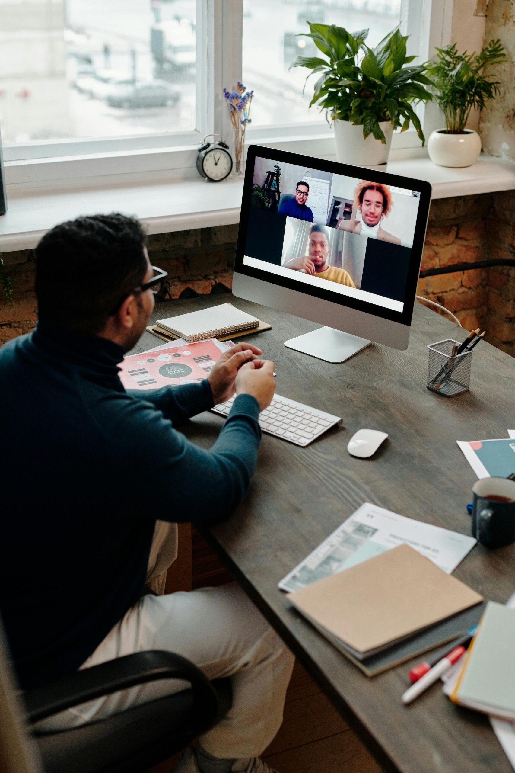 Man on a Microsoft Teams virtual meeting