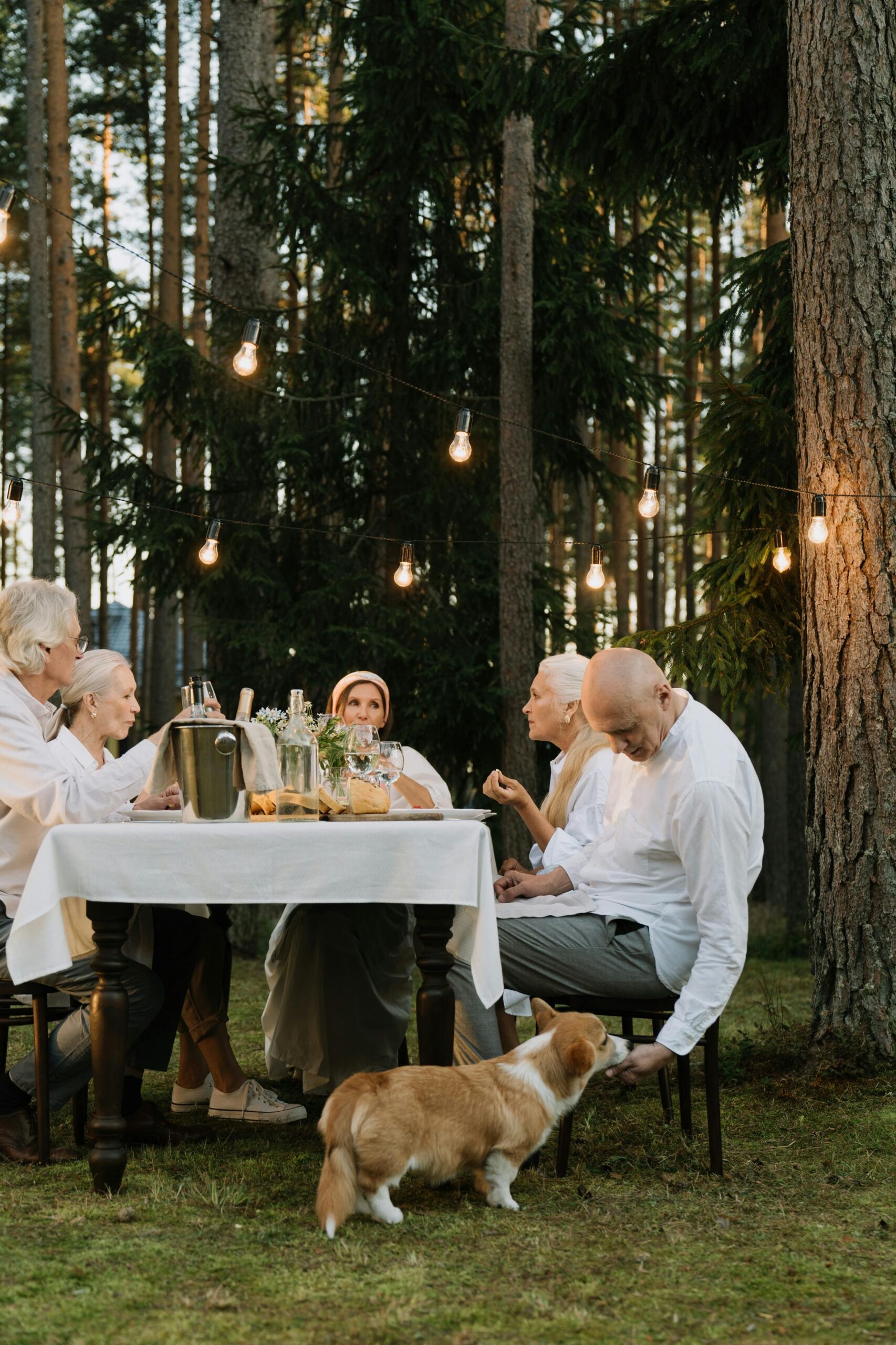 Family eating a meal together outdoors