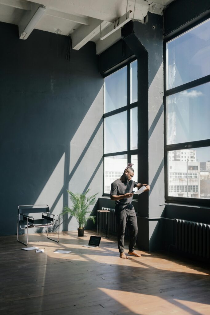 Investor comparing data points in high-rise