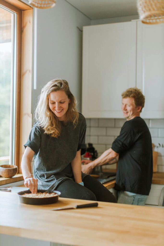 Couple making food in the kitchen